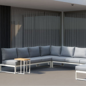 Outdoor furniture Denver sectional couch in Charcoal or White, aluminum outdoor furniture that transforms into an outdoor lounge chair, on a patio.