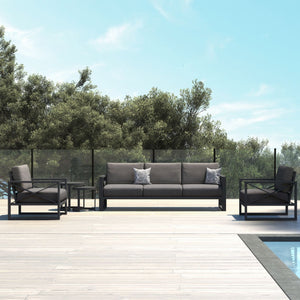 Outdoor furniture set from Linear Lounge collection, featuring aluminum outdoor lounge chair, two-seater, and three-seater on a patio with a couch, chairs, and a swimming pool.
