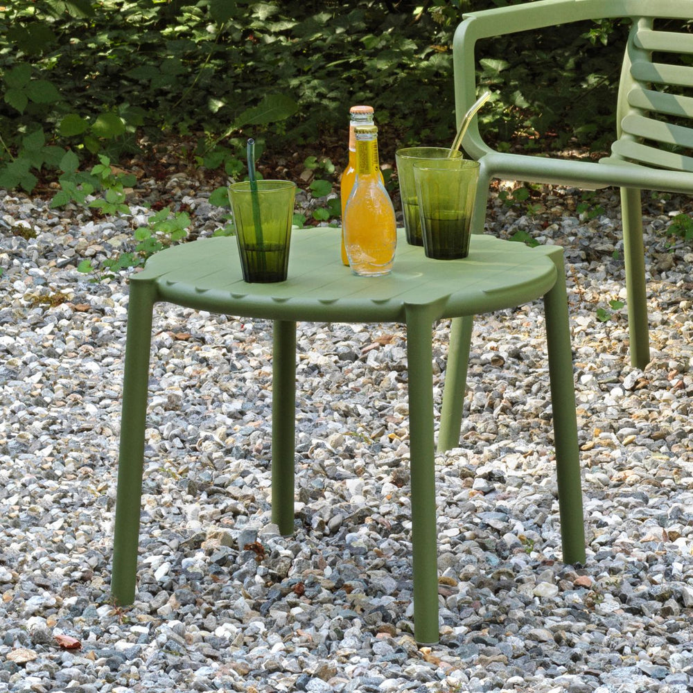 Designer Raffaello Galiotto's Doga Range outdoor furniture set with concrete table, made from recyclable resin.