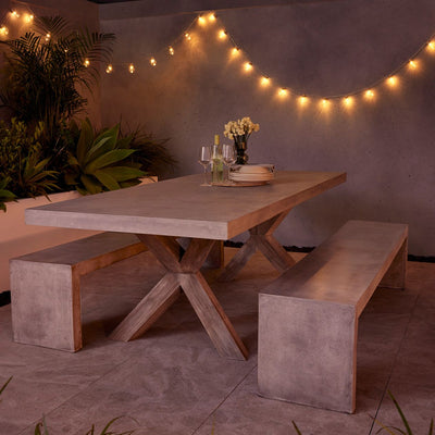 Zen square concrete table from our outdoor furniture collection, with customizable teak or metal legs.
