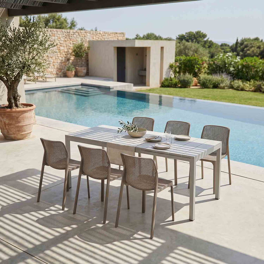 Nardi Rio Aluminium Extension Table with Bit Resin Armless Chair Outdoor Dining Setting