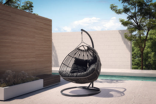 European style hanging egg chair by the pool
