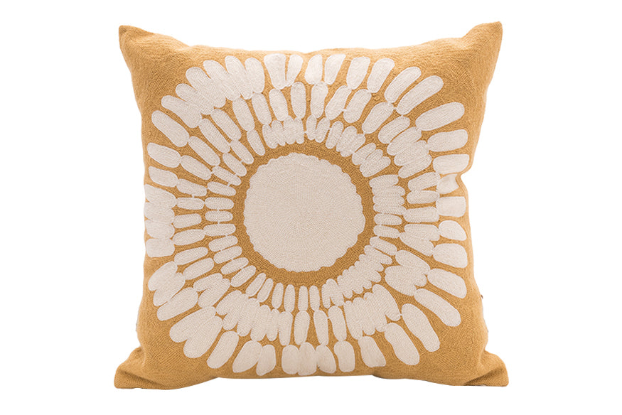 Warm amber cushion with a radiating design, set against a plain white background. This is just one example of our vibrant outdoor scatter cushions.