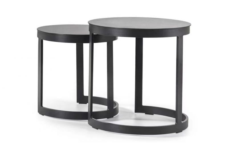 A set of nested Neverland Outdoor Aluminium Round Side Tables in Charcoal, with smooth tops and open circular bases, set against a white background.