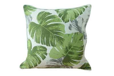 Outdoor cushion with a green leaf pattern, set against a plain white backdrop. This is just one example of our vibrant outdoor cushions for style and comfort.