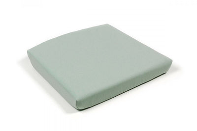 Light green outdoor chair cushion set against a plain white backdrop. This is just one example of our outdoor chair cushions for style and comfort.
