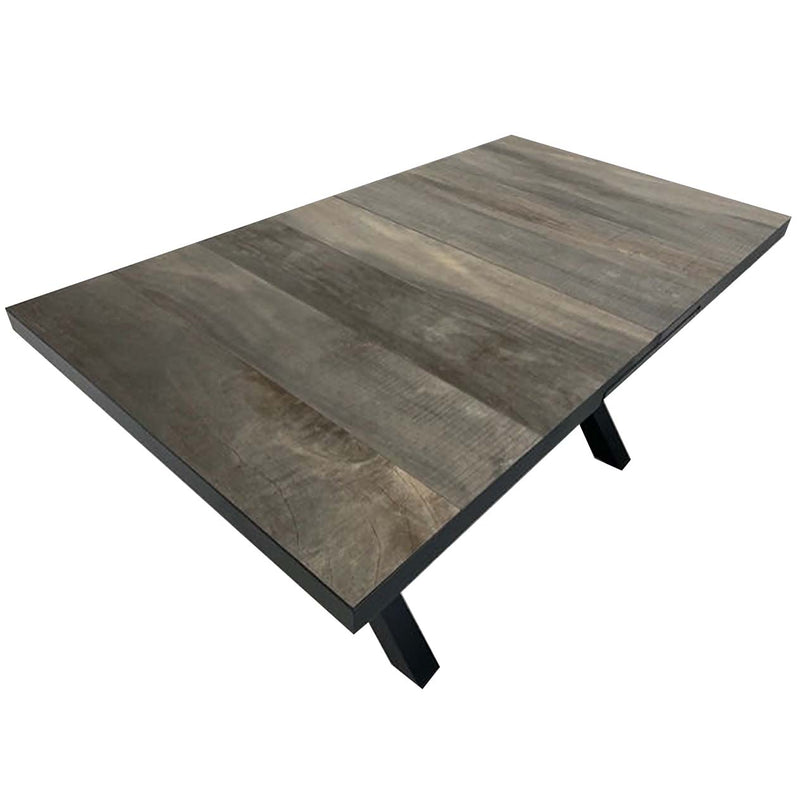 The ceramic tabletop of an extendable outdoor dining table from the &