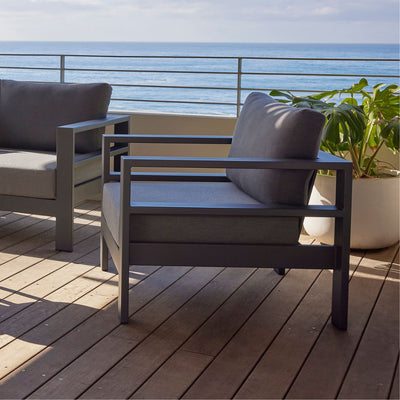 Albury outdoor furniture collection featuring outdoor chairs and aluminium outdoor furniture, covered with a lounge cover on a wooden deck.