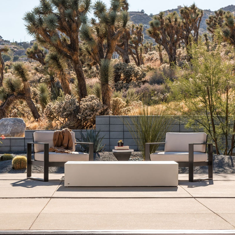 A 165 cm rectangular outdoor concrete coffee table in white, part of our &