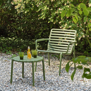 Designer Raffaello Galiotto's Doga Range of Outdoor Furniture, featuring vibrant Outdoor Chairs with and without armrests.