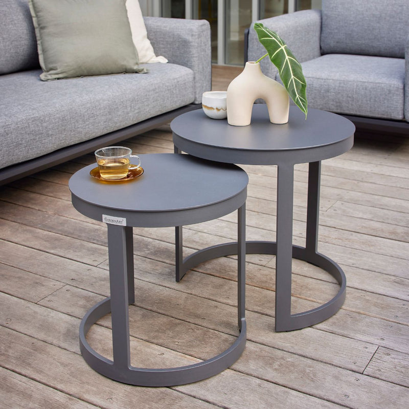 Two black round aluminium &
