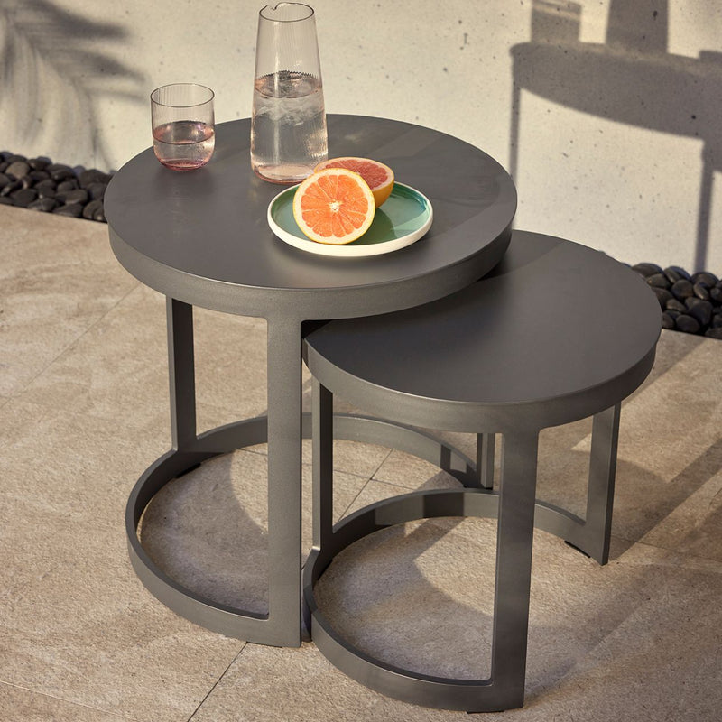 Two black round aluminium &