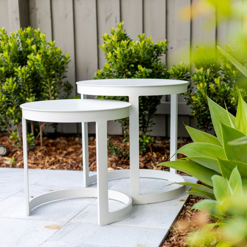 Two white round aluminium &