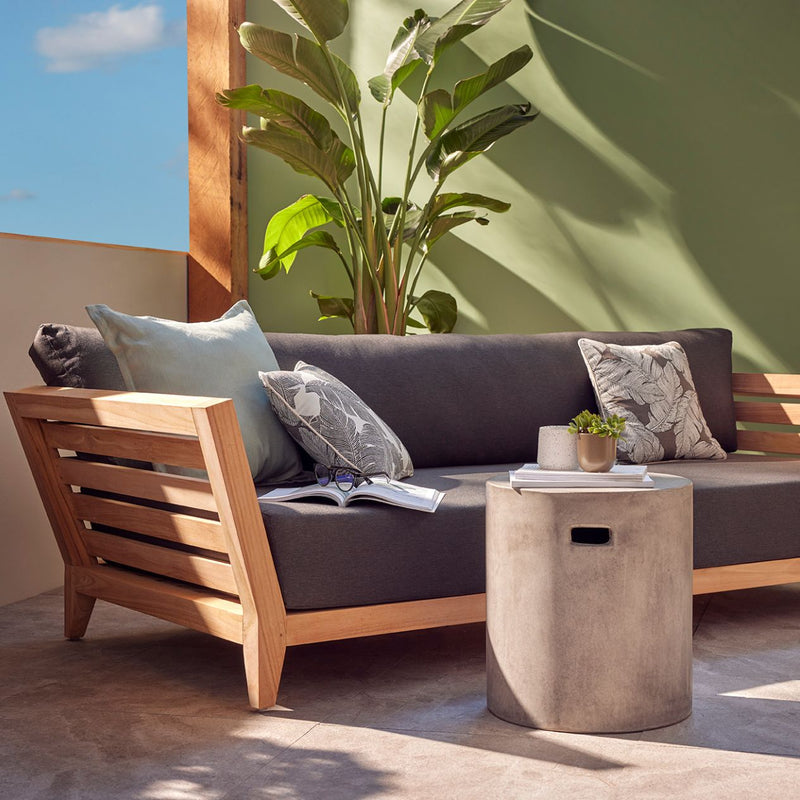 Outdoor chairs and lounge as part of the Ottawa family outdoor balcony furniture set, featuring a couch and a table on a patio, made from durable teak wood and Sunproof fabric.