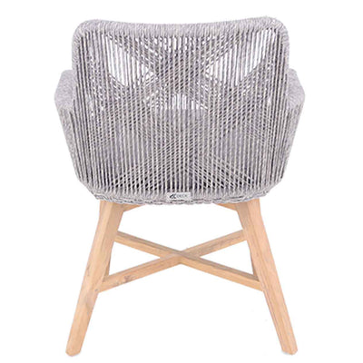 A back view of a wicker dining chair with natural frame, light grey fabric and white wicker set against a white background. This outdoor furniture piece is perfect for outdoor dining, featuring a whimsical wicker design.