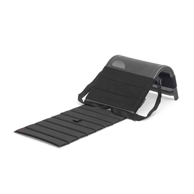 The black, aluminium 'Beach Buddy' outdoor backrest which functions as a portable sun lounger. Its curves provide support & comfort on the go. It is displayed on a plain white background, viewed from a front angle.