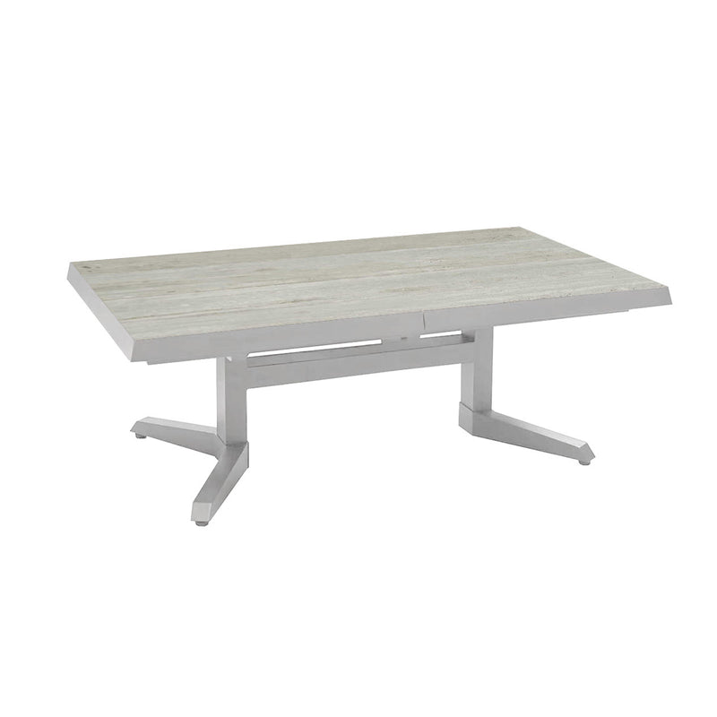 Clifton Range outdoor furniture featuring extendable concrete table with aluminium frame and woody grain details.