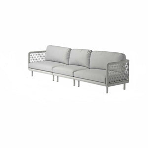 Outdoor furniture: A rope 3 seater lounge with light grey frame and light grey cushions on a white background, wicker lounge chair, outdoor lounge.