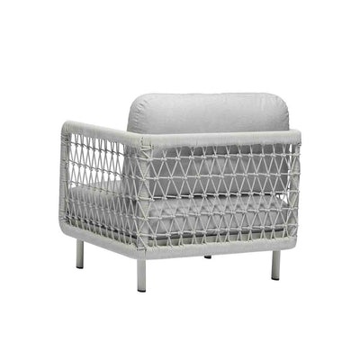 Outdoor furniture: Backview of a rope armchair with light grey frame and cushions set against a white background.