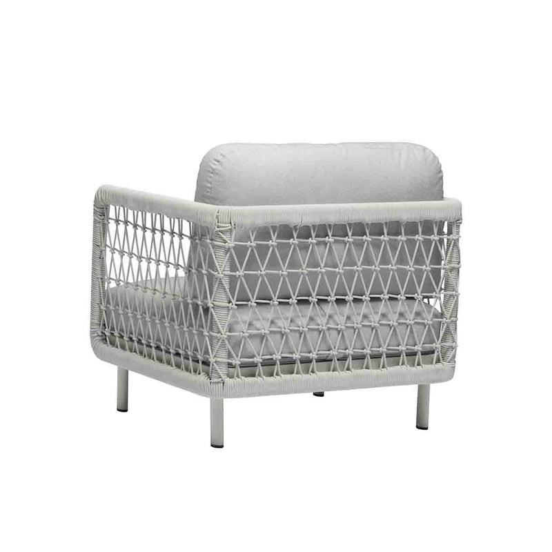 Outdoor furniture: Backview of a rope armchair with light grey frame and cushions set against a white background.