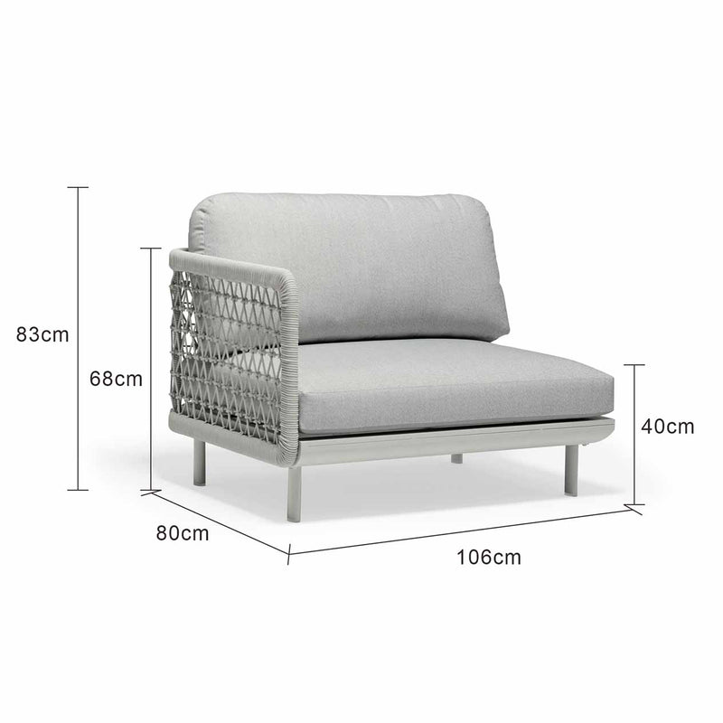 Outdoor furniture from the Colwood Collection featuring a wicker lounge chair, outdoor dining furniture, and a rope end chair with a light grey frame and cushion set against a white background.