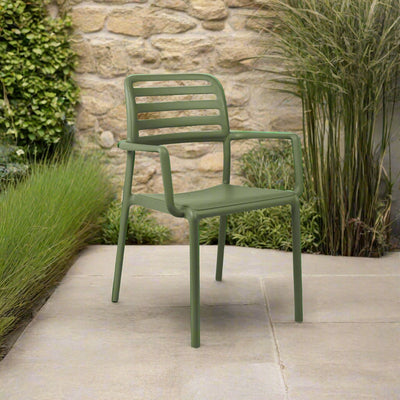 Nardi Costa Outdoor Resin Dining Chair in Agave Green. A sleek and durable Italian-designed chair made from weather-resistant fiberglass resin, featuring a slatted backrest, integrated armrests, and a lightweight yet sturdy structure perfect for outdoor dining spaces.