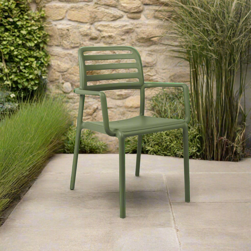 Nardi Costa Outdoor Resin Dining Chair in Agave Green. A sleek and durable Italian-designed chair made from weather-resistant fiberglass resin, featuring a slatted backrest, integrated armrests, and a lightweight yet sturdy structure perfect for outdoor dining spaces.