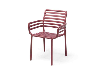 Red resin Nardi Doga outdoor dining chair with arms, perfect for alfresco furniture setups, displayed on a plain white background, viewed from a front angle.