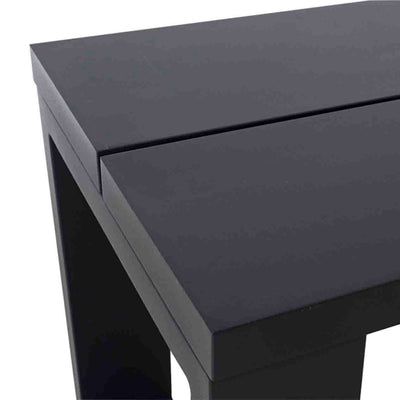 A close-up on the top of a black aluminium outdoor bench, which is displayed on a plain white background.