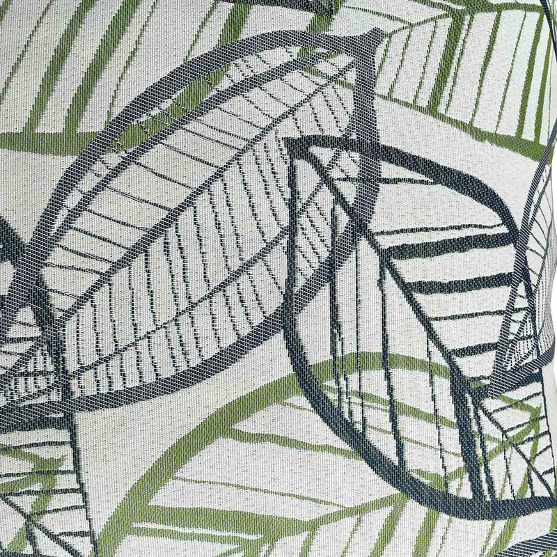 Close up on the white, grey, and green Amazon-inspired leaf pattern design on an outdoor scatter cushion, perfect for outdoor furniture setups.