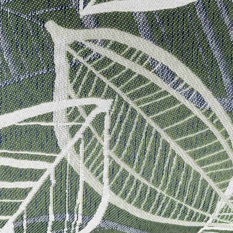 Close up on the white, grey, and green Amazon-inspired leaf pattern design on an outdoor scatter cushion, perfect for outdoor furniture setups.