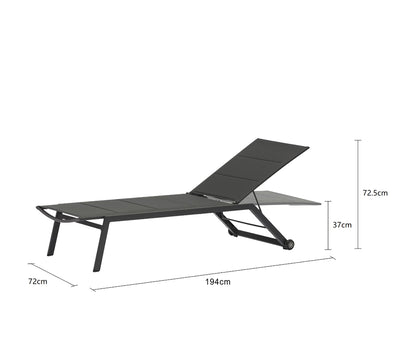 Sleek black aluminium 'Kent' outdoor sun lounger displayed on a plain white background, viewed from a front angle, with its measurements shown at 194 cm long, 72 cm wide, and 72.5 cm tall.
