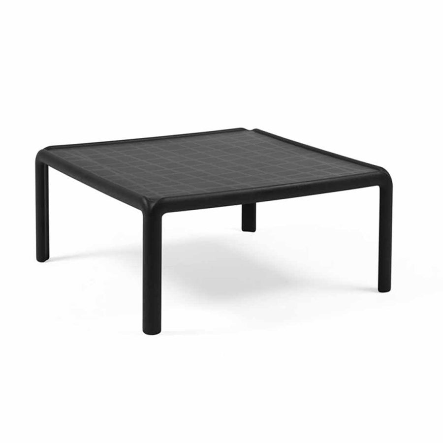 Modern Nardi Komodo Tavolino Vetro outdoor furniture, a concrete table with a clear glass top and durable resin frame.