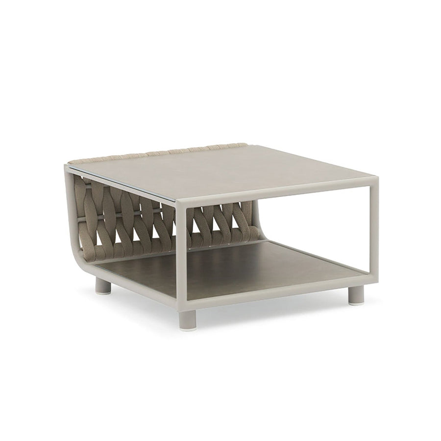 Outdoor furniture from the Lawson Collection featuring a wicker lounge chair, outdoor dining furniture, and a rope coffee table with charcoal frame on a white background.