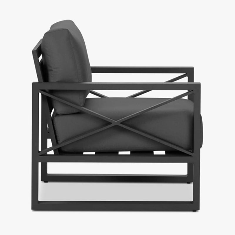 Aluminum outdoor furniture from Linear Lounge collection, featuring outdoor chairs and outdoor lounge in charcoal or white, perfect for festive configurations. Current image: A black chair with a grey cushion on it.