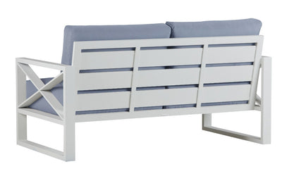 Aluminum outdoor furniture from Linear Lounge collection, including outdoor chairs and outdoor lounge, in charcoal or white. A white bench with a blue cushion on it.