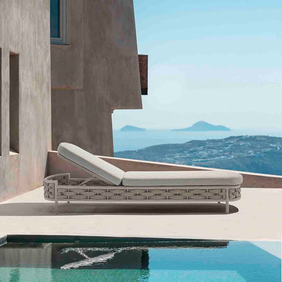 Beige Boston Outdoor Rope Sunlounger set poolside in a sleek modern European house outdoor area, perfectly embodying the essence of sophisticated outdoor living.