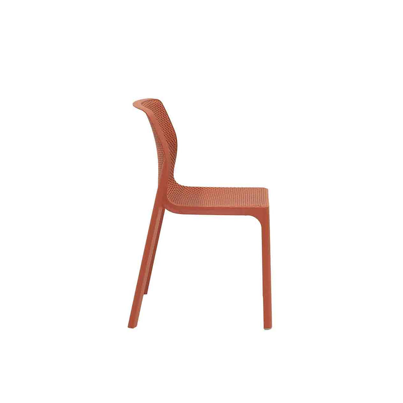Red Resin Nardi Bit Outdoor Dining Chair displayed on a plain white background, viewed from the side.