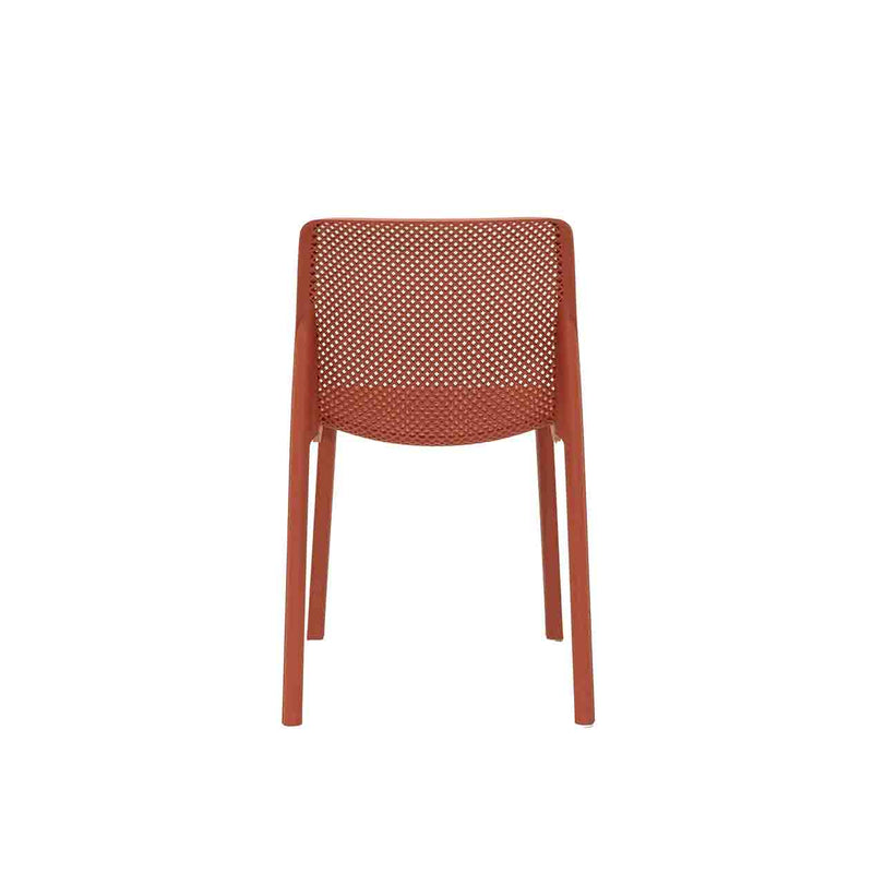 Red Resin Nardi Bit Outdoor Dining Chair displayed on a plain white background, viewed from the back.