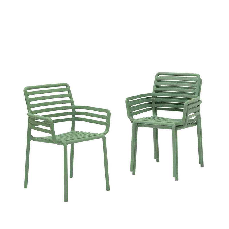 Three Light Green Resin Nardi Doga Outdoor Dining Chairs (with arms) displayed against a plain white background. Two are stacked on top of each other, while the other is by itself.