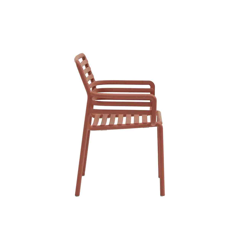Red Resin Nardi Doga Outdoor Dining Chair (with arms) displayed on a plain white background, viewed from the side.