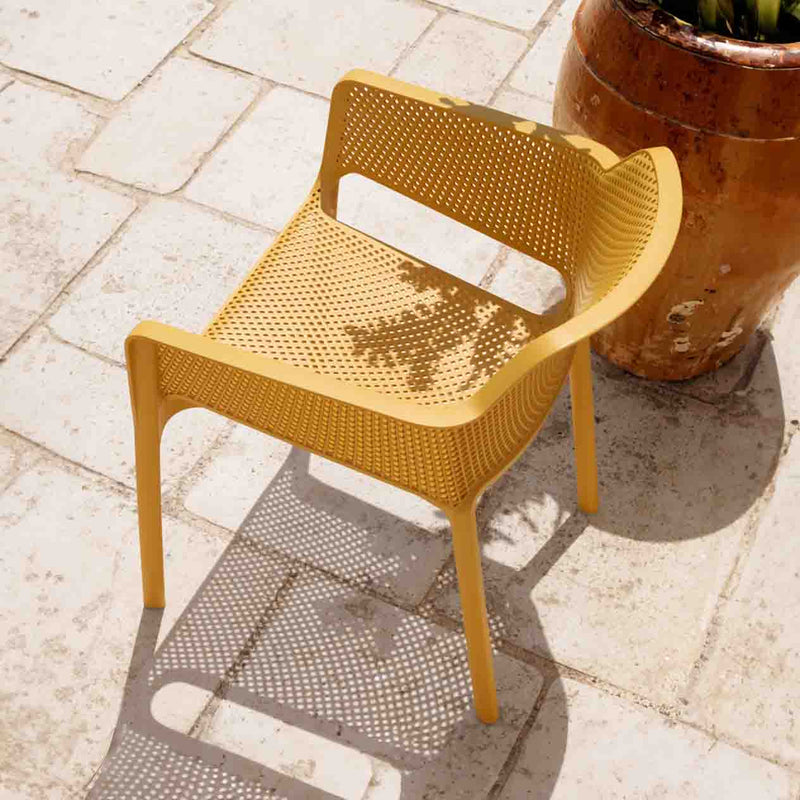 Nardi Net chair with unique mesh pattern, recyclable resin, available in various colors for outdoor furniture