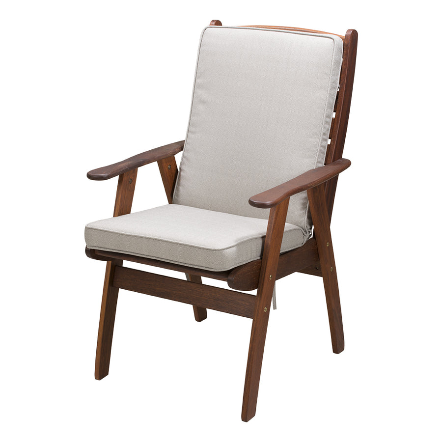 Outdoor wooden armchair featuring a large, light-grey, back & seat cushion. The armchair is displayed on a plain white background, viewed from a front angle.