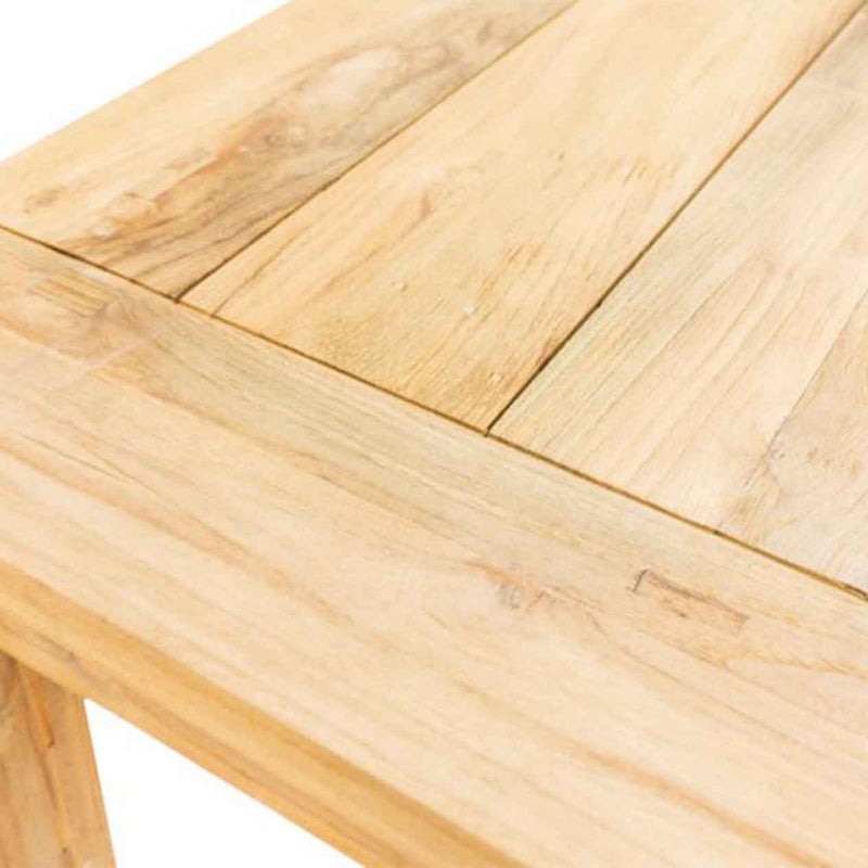 A close up of a recycled teak dining table with natural frame set against a white background. Outdoor furniture, outdoor dining furniture, outdoor balcony furniture.