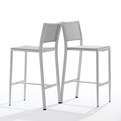 Two white aluminium 'Largo' outdoor bar stools, set back to back on a plain white background, viewed from an angle.