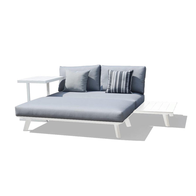 Positano aluminum outdoor furniture set featuring outdoor chairs, outdoor lounge, ottoman, and daybed in charcoal and white with grey cushions, easily transformable into a side table - a couch with pillows and a coffee table.