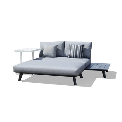 Positano aluminum outdoor furniture set featuring outdoor chairs, outdoor lounge, ottoman, and daybed in charcoal and white colors with a couch and a table on a white background.