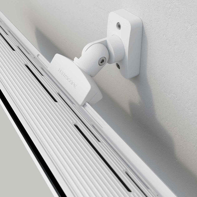 Close-up of the back attachment part of a white Heatscope Outdoor Pure+ heater mounted on a white wall, designed for efficient outdoor heating in stylish living spaces.