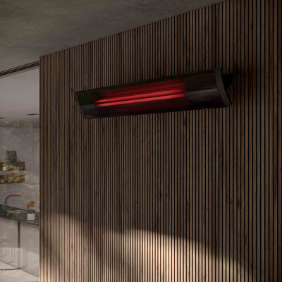 A stylish Heatscope Outdoor Pure+ 3000W heater installed on a wooden wall, providing warmth and a modern look for outdoor living spaces.
