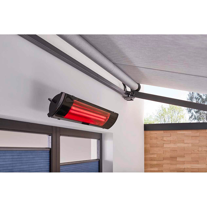 Heatscope Outdoor Pure+ heater providing warmth in an outdoor area during the day, making it perfect for year-round outdoor living.